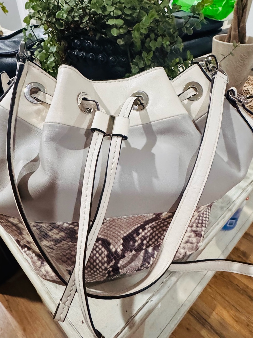 Michael Kors women’s White Drawstring Bucket Bag with Snake-Print Panel